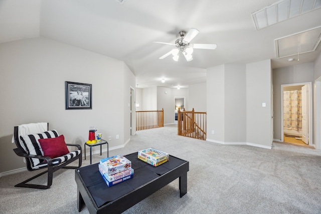 8312 Rancho De La Osa Trl, Mckinney, TX 75070 - living room featuring attic access, carpet, a ceiling fan, baseboards, and lofted ceiling