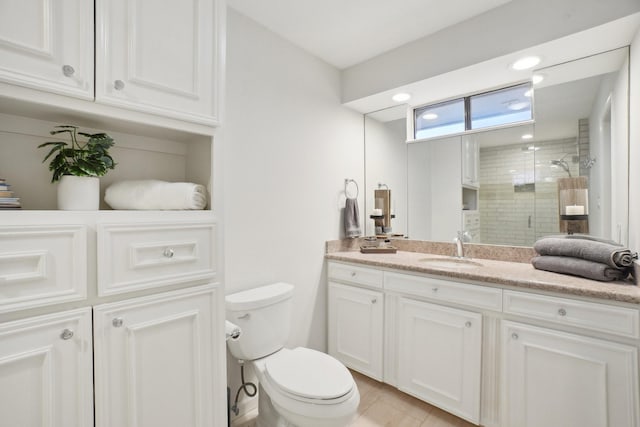 3139 Citation Dr, Dallas, TX 75229 - bathroom with a shower stall, vanity, toilet, and recessed lighting