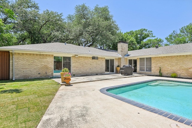 3139 Citation Dr, Dallas, TX 75229 - swimming pool with a patio area and a lawn