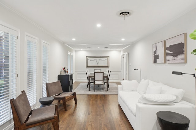 3139 Citation Dr, Dallas, TX 75229 - living room with dark wood-type flooring, ornamental molding, recessed lighting, and a decorative wall