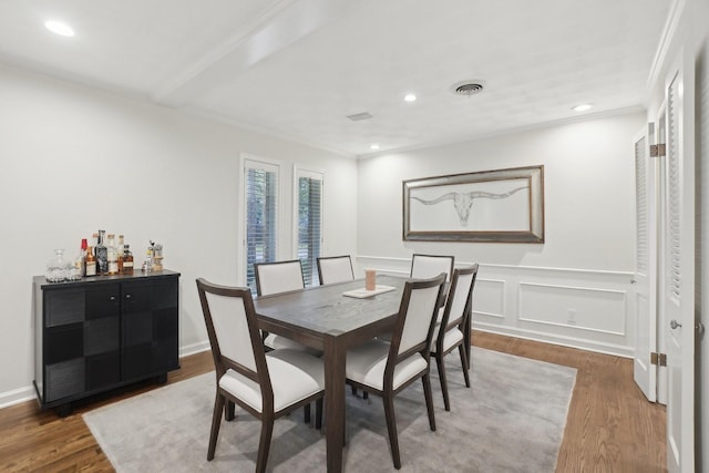 3139 Citation Dr, Dallas, TX 75229 - dining room featuring wood finished floors, ornamental molding, and recessed lighting