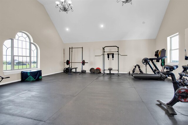exercise room with a chandelier, high vaulted ceiling, baseboards, and recessed lighting