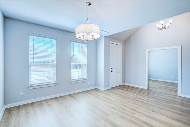 1208 Arcadia Ln, Northlake, TX 76226 - unfurnished dining area with a chandelier, light wood-style flooring, and baseboards