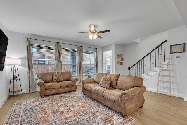 5420 Otter Trl, Fort Worth, TX 76179 - living area featuring a ceiling fan, light wood-style flooring, and baseboards