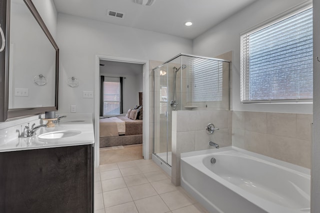 5420 Otter Trl, Fort Worth, TX 76179 - ensuite bathroom with tile patterned floors, a bath, a shower stall, and double vanity