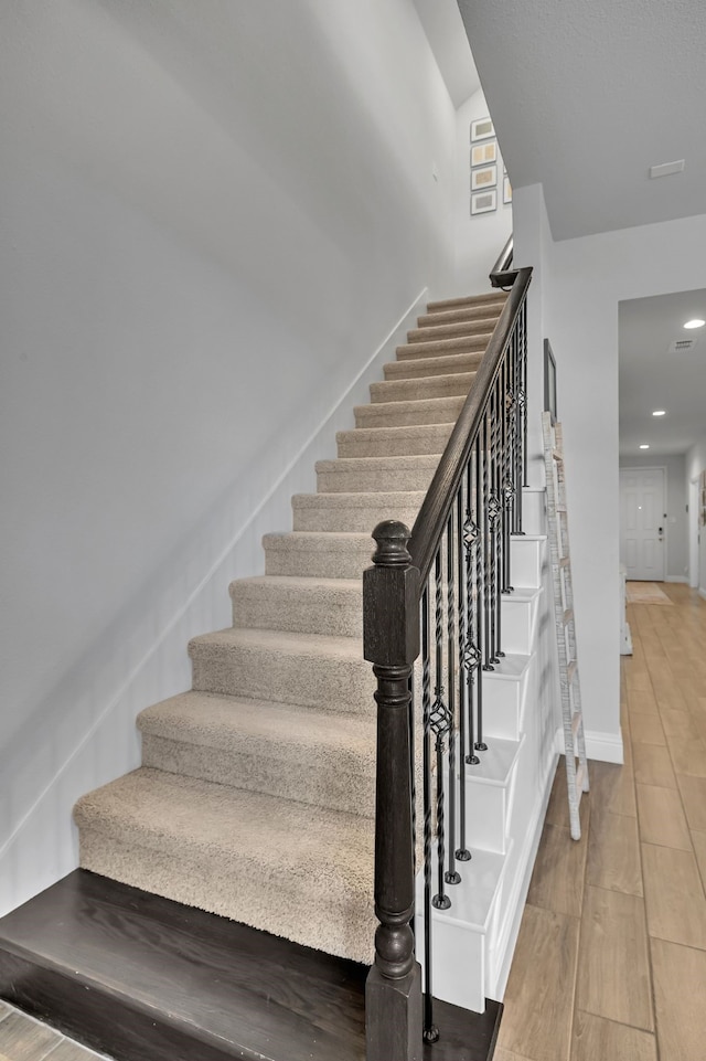 5420 Otter Trl, Fort Worth, TX 76179 - staircase with wood finished floors and baseboards