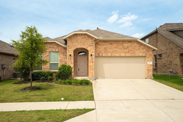 825 Blackhorse Trl, Fort Worth, TX 76247 - view of front of home with brick siding, a front yard, an attached garage, concrete driveway, and central AC