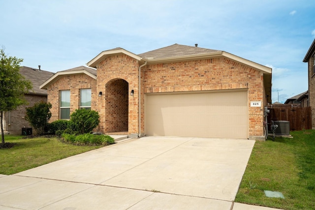 825 Blackhorse Trl, Fort Worth, TX 76247 - view of front of property featuring brick siding, a garage, driveway, a shingled roof, and central air condition unit