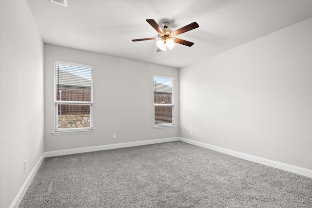 825 Blackhorse Trl, Fort Worth, TX 76247 - spare room featuring carpet flooring, a ceiling fan, and baseboards