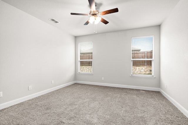 825 Blackhorse Trl, Fort Worth, TX 76247 - carpeted empty room with a ceiling fan, plenty of natural light, and baseboards
