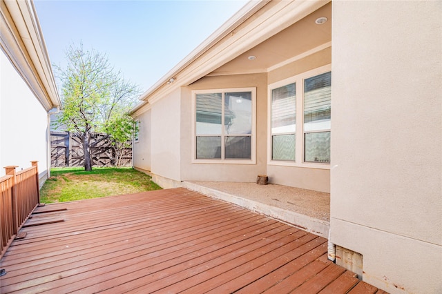 wooden deck featuring fence