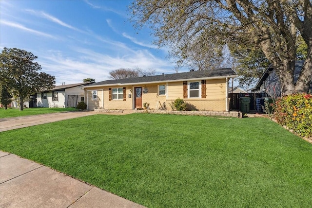 405 Rosewood Hills Dr, Garland, TX 75040 - single story home featuring brick siding, a front yard, and fence