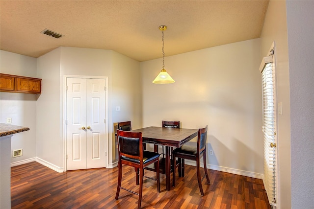 3331 Midstream Ct, Mesquite, TX 75181 - dining area with dark wood-type flooring and baseboards