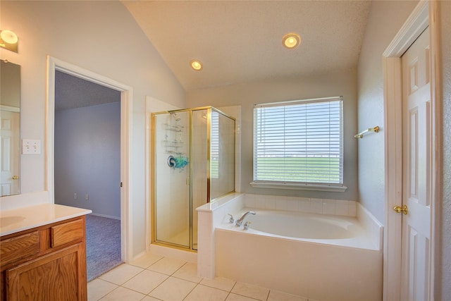 3331 Midstream Ct, Mesquite, TX 75181 - full bathroom with tile patterned floors, a bath, vanity, lofted ceiling, and a shower stall