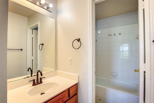 3331 Midstream Ct, Mesquite, TX 75181 - full bath featuring vanity, washtub / shower combination, and a textured wall