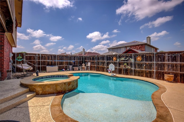 3331 Midstream Ct, Mesquite, TX 75181 - view of swimming pool featuring a fenced backyard, a pool with connected hot tub, and a patio area