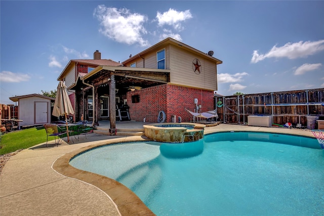 3331 Midstream Ct, Mesquite, TX 75181 - view of swimming pool with a patio area and a pool with connected hot tub