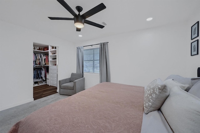 carpeted bedroom featuring visible vents, a closet, ceiling fan, and recessed lighting