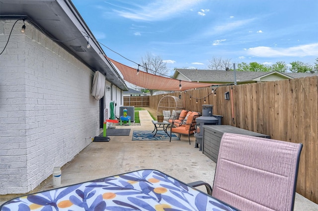 view of patio featuring a fenced backyard