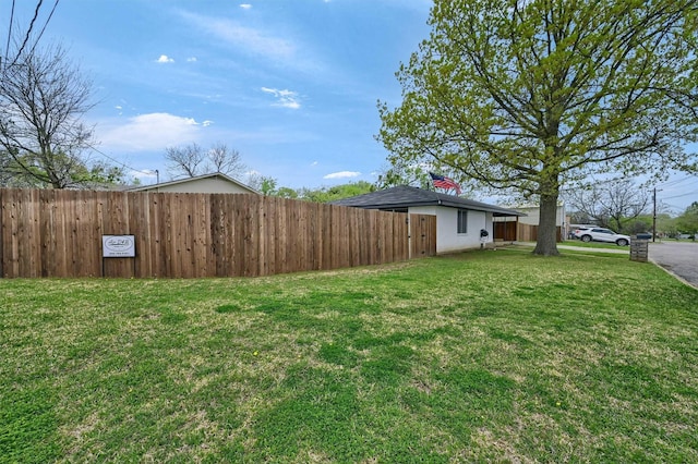 view of yard featuring fence