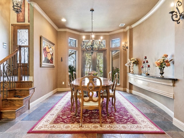 9 Eagle Pt N Unit A, Azle, TX 76020 - dining space with a chandelier, ornamental molding, stone tile flooring, baseboards, and stairway