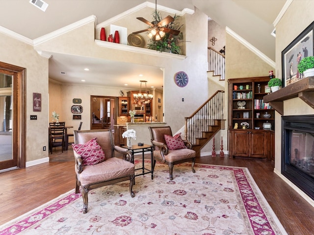 9 Eagle Pt N Unit A, Azle, TX 76020 - living room featuring stairway, wood finished floors, a glass covered fireplace, ceiling fan, and baseboards