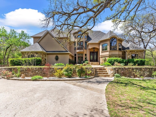 9 Eagle Pt N Unit A, Azle, TX 76020 - french country home with stone siding, stucco siding, and french doors