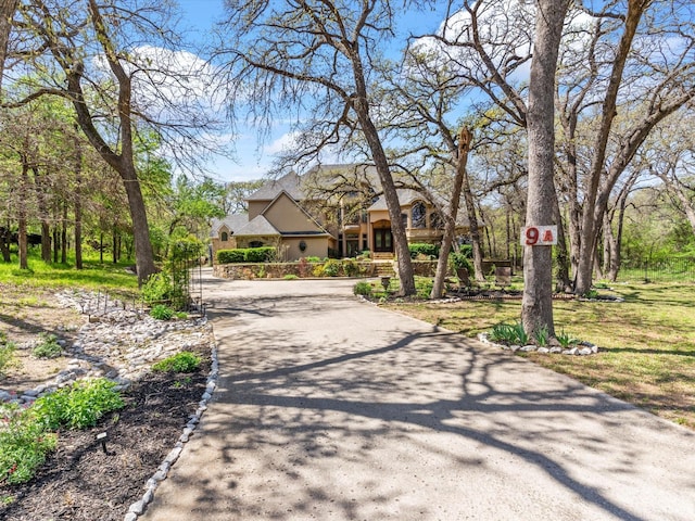 9 Eagle Pt N Unit A, Azle, TX 76020 - view of front facade with stucco siding and driveway
