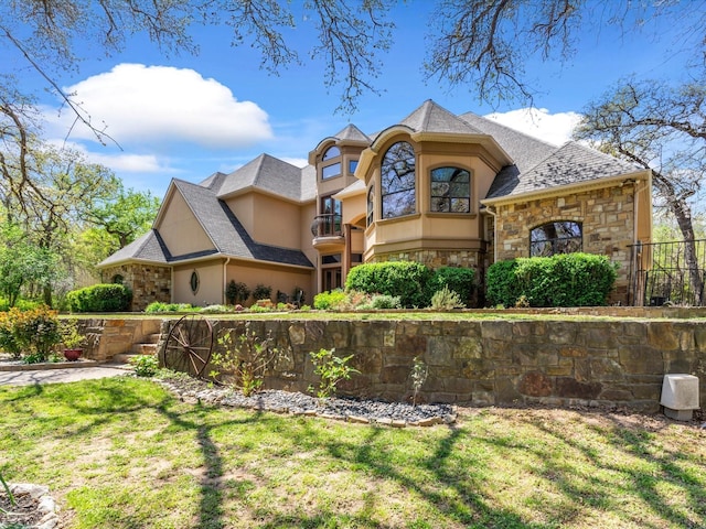 9 Eagle Pt N Unit A, Azle, TX 76020 - back of property with stucco siding, stone siding, and a balcony