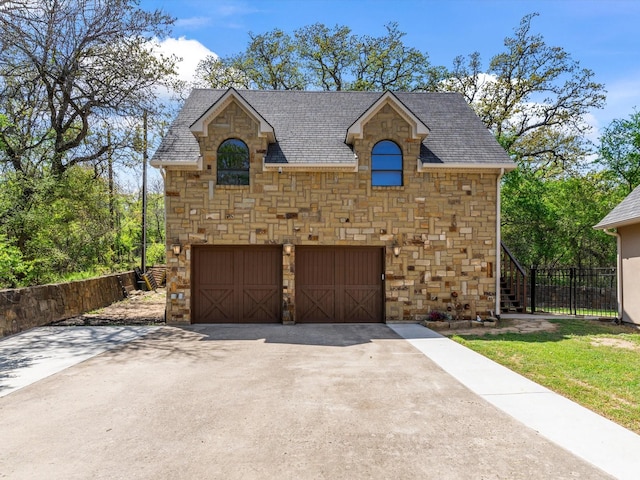 9 Eagle Pt N Unit A, Azle, TX 76020 - french provincial home featuring stone siding, driveway, an attached garage, roof with shingles, and fence