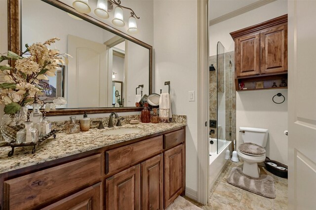 7545 Colton Ln, Pilot Point, TX 76258 - bathroom with toilet, vanity, ornamental molding, and shower / tub combination