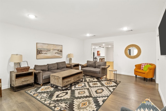 1018 Brookhollow Dr, Irving, TX 75061 - living area featuring wood finished floors, baseboards, and recessed lighting