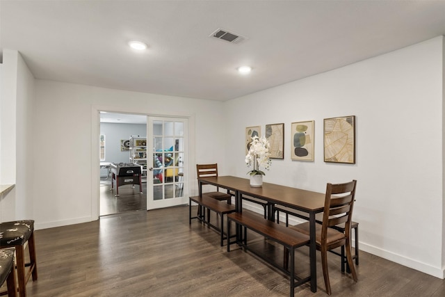 1018 Brookhollow Dr, Irving, TX 75061 - dining space with dark wood-type flooring, french doors, baseboards, and recessed lighting