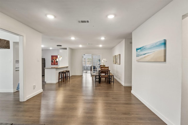 1018 Brookhollow Dr, Irving, TX 75061 - dining room with dark wood-type flooring, baseboards, and recessed lighting
