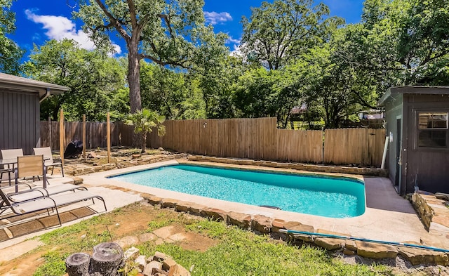 1018 Brookhollow Dr, Irving, TX 75061 - view of swimming pool featuring a patio and a fenced backyard