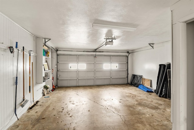 1018 Brookhollow Dr, Irving, TX 75061 - garage featuring a garage door opener
