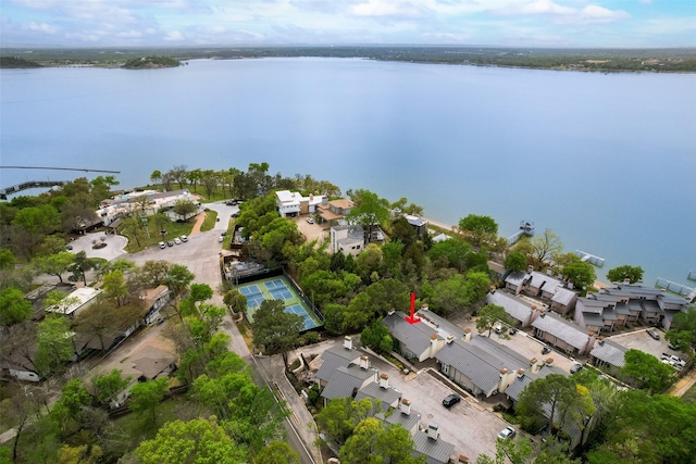 birds eye view of property featuring a residential view and a water view