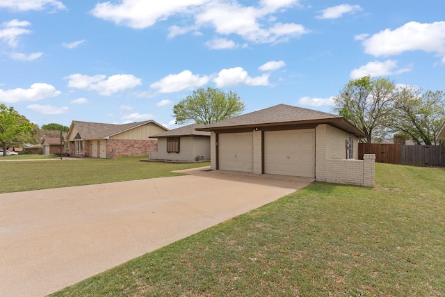 ranch-style house with concrete driveway, fence, brick siding, a front lawn, and a garage