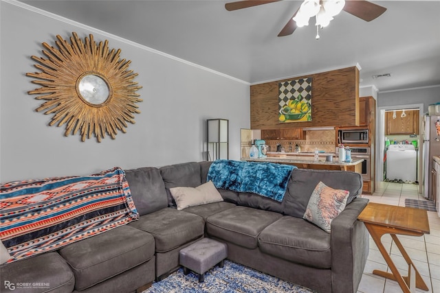 1806 Ray Ave, Bossier City, LA 71112 - living area with crown molding, washer / clothes dryer, a ceiling fan, visible vents, and light tile patterned flooring