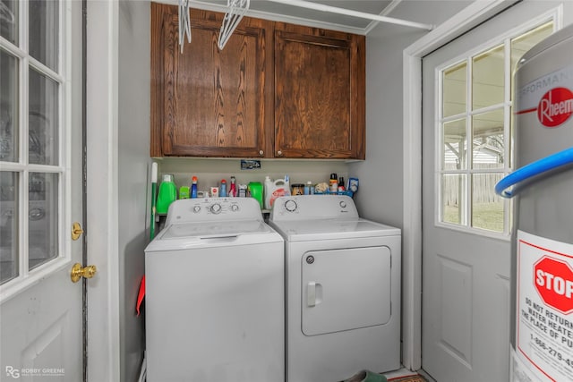 1806 Ray Ave, Bossier City, LA 71112 - laundry area with cabinet space, gas water heater, and washer and dryer