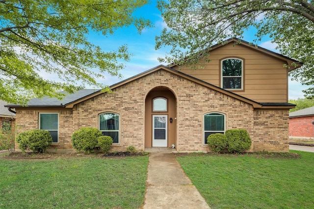 5501 Whisper Glen Dr, Arlington, TX 76017 - traditional-style home featuring brick siding and a front lawn
