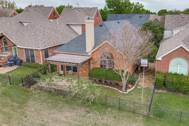 2212 Stone Creek Dr, Mckinney, TX 75072 - view of front facade with a chimney, brick siding, and roof with shingles
