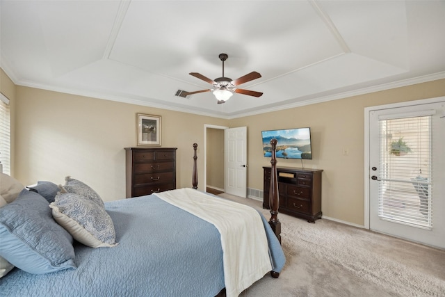 2002 Thames Dr, Arlington, TX 76017 - bedroom with light colored carpet, a raised ceiling, a ceiling fan, crown molding, and access to exterior