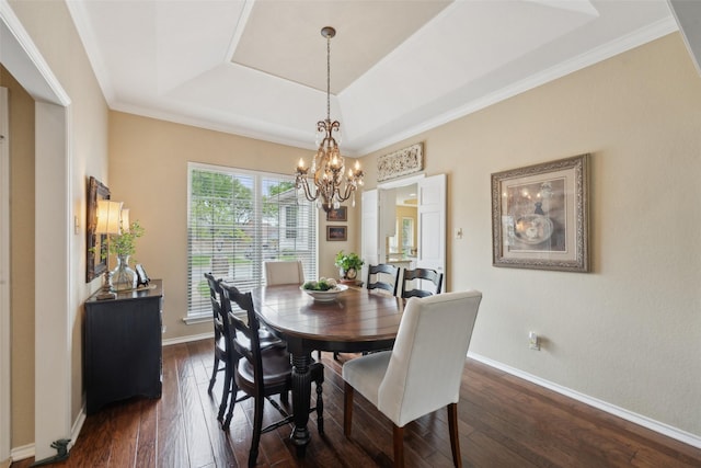 2002 Thames Dr, Arlington, TX 76017 - dining area with a tray ceiling, dark wood-style flooring, a chandelier, and crown molding