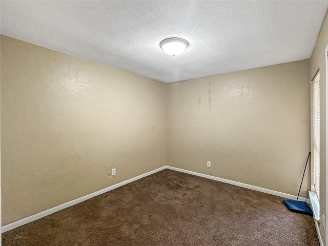 411 Mckinley St, Cedar Hill, TX 75104 - carpeted spare room featuring a textured ceiling and baseboards