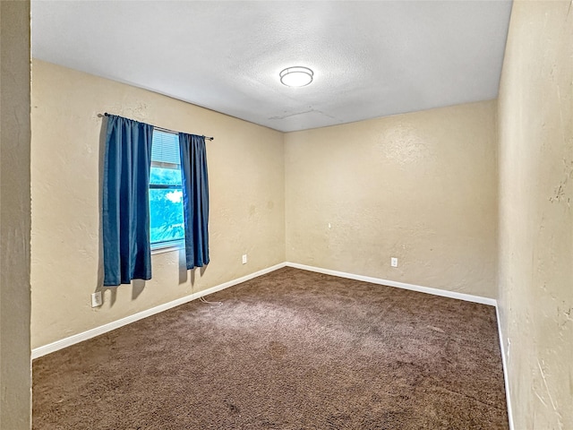 411 Mckinley St, Cedar Hill, TX 75104 - carpeted spare room with a textured wall, a textured ceiling, and baseboards