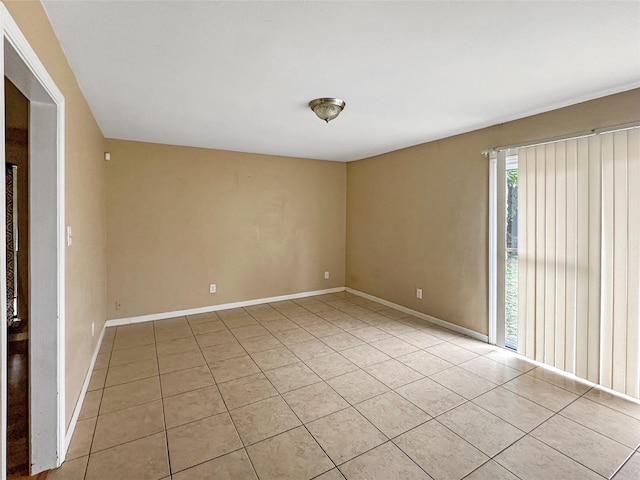 411 Mckinley St, Cedar Hill, TX 75104 - spare room featuring light tile patterned flooring and baseboards