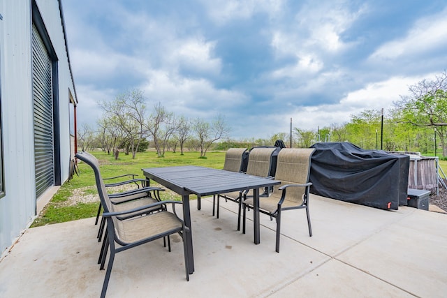 view of patio with outdoor dining space
