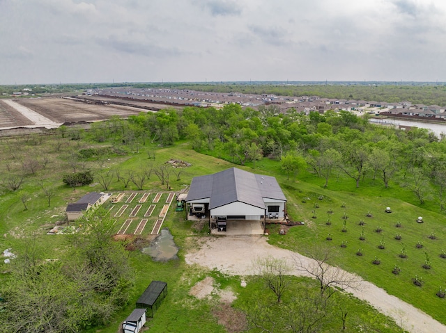 birds eye view of property featuring a rural view