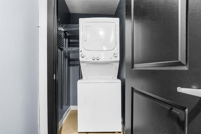 1200 Main St Unit 1511, Dallas, TX 75202 - laundry area with stacked washing maching and dryer and laundry area